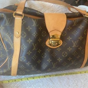 Louis Vuitton Stressa purse (Numered). Great shape. Ink stains inside.